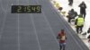 Daniel Ndiritu Gatheru of Kenya finishes third the Athens Classic Marathon at the Panathinaikon Stadium in Athens, on Sunday, Nov. 13, 2011. About 18,000 people took part in the marathon and two shorter races of 5 kms and 10 kms as the race was run in c