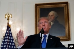 President Donald Trump makes a statement on Iran policy in the Diplomatic Reception Room of the White House, in Washington, Oct. 13, 2017.