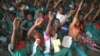 FILE - Schoolchildren participate in a class on malaria and how to protect themselves, Malawi.