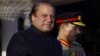 Newly elected Prime Minister of Pakistan Nawaz Sharif, left, arrives at the Prime Minister''s house to review guards of honor in Islamabad, Pakistan, June 5, 2013. 