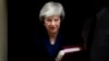 La primera ministra británica, Theresa May, asiste a la sesión semanal de preguntas en el parlamento de Londres, el miércoles 12 de diciembre de 2018.