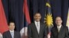 President Barack Obama, center, is joined for a photo with ASEAN leaders, from left,Vietnam Priesident Nguyen Minh Triet, and Philippines President Benigno Aquino III, before a luncheon in New York, Friday, Sept. 24, 2010. 