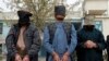 Captured Taliban insurgents are presented to the media in Kandahar province, Afghanistan, Jan. 7, 2014.