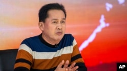 FILE - Apollo Carreon Quiboloy appears on his talk show on May 23, 2016, in Davao City, southern Philippines. He is accused of sexual abuse and human trafficking in the Philippines and similar charges in the United States. 