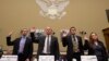 Witnesses, from left, Joel Beauvais, acting deputy assistant administrator, Office of Water, EPA; Keith Creagh, director, Department of Environmental Quality, State of Michigan; Marc Edwards, Virginia Tech professor, Environmental and Water Resources Engineering; and Flint, Michigan, resident LeeAnne Walters, are sworn in on Capitol Hill in Washington, Feb. 3, 2016, prior to testifying before the House Oversight and Government Reform Committee hearing to examine the ongoing situation in Flint, Michigan. 