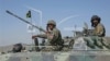 Afghan National Army soldiers prepare for a military exercise near Kabul on April 30, 2014. Afghan troops this week reportedly killed at least 60 insurgents near the Pakistani border. 