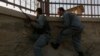 Afghan policemen take their positions at the site of an attack in Kabul, July 17, 2014.