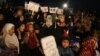 Shi'ite Muslims take part in a protest against Saturday's bomb attack, in Quetta, Pakistan, February 18, 2013.