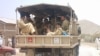 Pakistani paramilitary soldiers patrol in Malikhel village near Parachinar, the main town of the Kurrum region on the Afghan border, about 265 km (165 miles) from Islamabad, June 2006 file photo. 