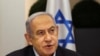 Perdanan Menteri Israel Benjamin Netanyahu memimpin rapat kabinet mingguan di Tel Aviv, Israel, pada 7 Januari 2024. (Foto: Reuters/Ronen Zvulun)