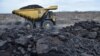 Kegiatan pertambangan batubara di Kalimantan (foto ilustrasi/ Antara). Churchill Mining PLC berusaha berinvestasi di Indonesia, dengan mencoba melakukan eksplorasi di tambang batubara Kutai Timur, namun belum terlaksana dan terlibat sengketa hukum dengan pemerintah Indonesia.