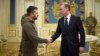 FILE - Ukrainian President Volodymyr Zelenskyy, left, and White House national security adviser Jake Sullivan shake hands during their meeting in Kyiv, Ukraine, Nov. 4, 2022. (Ukrainian Presidential Press Office via AP)