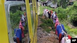 Many will be evicted from their homes as the government, along with foreign aid agencies, restarts the country's long-unused railroad, in an effort to spur the economy and link up with the other economies of the Mekong River region of Southeast Asia.