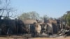 Gidajen da suka kone bayan hare-haren Boko Haram a bama, Fabrairu 20, 2014.
