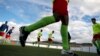 Alma de Africa Union Deportiva's players warm up before a football match against Espera CF in Espera, March 18, 2018. 