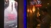 A movie-goer is checking his phone await the screening of “First They Killed My Father” at Major Cineplex Cinema, Phnom Penh, Cambodia, on September 21st, 2017. (Khan Sokummono/VOA Khmer) 