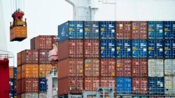 VOA Asia – China’s massive economy slows slightly