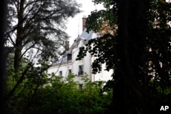 FILE - The manor of Bashar al-Assad’s uncle, Rifaat al-Assad, is seen, in Bessancourt, north of Paris, Sept. 13, 2013. The manor whose real estate portfolio in the Paris region alone is estimated at Euros 160 million. A property in London, once owned by Rifaat al-Assad, was sold before it could be seized by authorities.