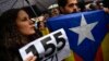 People gather at Plaza Consistorial square during a protest against Article 155 of the Constitution, which gives the central government extra powers to re-establish the rule of law in a region, in Pamplona, northern Spain, Spain, Nov. 5, 2017. 