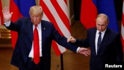 ABŞ prezidenti Donald Tramp və Rusiya prezidenti Vladimir Putin Helsinkidə zirvə görüşündən sonra birgə mətbuat konfransında, 16 iyul, 2018.