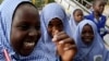 Schoolgirls play outside El-Kanemi Islamic School, where both Western and Islamic curriculums are taught, in Maiduguri.