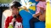 Akemi Vargas, 8, cries as she talks about being separated from her father during a rally against family separations, in Phoenix, Arizona, June 18, 2018.