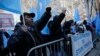 Uighurs and their supporters rally in front of the Permanent Mission of China to the United Nations in New York, March 15, 2018, to protest a sweeping crackdown against members of the ethnic minority in China.