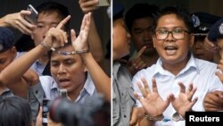 ရိုက်တာသတင်းထောက် ကိုကျော်စိုးဦး (ဝဲ) နှင့် ကိုဝလုံး (ယာ)။