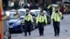  British police officers walk within a cordoned off area after an attack in the London Bridge area of London, June 4, 2017. Saturday night attackers killed several people in a series of vehicle and knife attacks before police shot them dead.