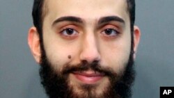 FILE - This April 2015 booking photo released by the Hamilton County, Tennessee, sheriff's office shows a man identified as Muhammad Youssef Abdulazeez.