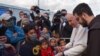 Papa Francisco (de branco) em Lesbos