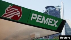 FILE - A Pemex gas station is seen in Mexico City, Mexico, Sept. 17, 2019. 
