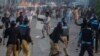 Anti-government protesters clash with riot police during unrest in Islamabad September 1, 2014.