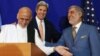 Afghan presidential candidate Abdullah Abdullah, from right, U.S. Secretary of State John Kerry and Afghan presidential candidate Ashraf Ghani Ahmadzai share a light moment at the podium during a joint press conference in Kabul, Afghanistan, Aug. 8, 2014.