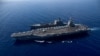 Kapal induk terbesar di dunia USS Gerald R. Ford berlayar bersama USNS Laramie (T-AO-203) saat mengisi bahan bakar di laut di Laut Mediterania bagian timur. (Foto: via Reuters)