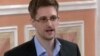 In this image made from video released by WikiLeaks on Friday, Oct. 11, 2013, former National Security Agency systems analyst Edward Snowden speaks during a presentation ceremony in Russia. 