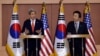 U.S. Secretary of State John Kerry, left, answers reporters' question as South Korean Foreign Minister Yun Byung-se listens during a joint press conference at Foreign Ministry in Seoul, South Korea, April 12, 2013.