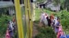 Many will be evicted from their homes as the government, along with foreign aid agencies, restarts the country's long-unused railroad, in an effort to spur the economy and link up with the other economies of the Mekong River region of Southeast Asia.