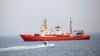 FILE - The rescue vessel Aquarius is seen approaching Pozzallo harbor, in southern Italy, June 1, 2018. 