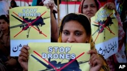 FILE - Women supporters of a political party rally against the U.S. drone strikes in Pakistani tribal areas, in Peshawar, Pakistan.