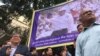 Lawmakers and high-ranking officials of Cambodia National Rescue Party(CNRP) hold banner in front of the party's headquarters in Phnom Penh to demand the release of Kem Sokha, the party current leader, September 25, 2017. (Kann Vicheika,VOA Khmer)