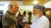 Pakistani official Sartaj Aziz (left) with Afghan Energy Minister Ismail Khan in Islamabad, Pakistan, Sept. 18, 2013.