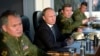 Shugaban Rasha, Vladimir Putin a wani taro da dakarun kasar kan batun Syria