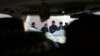Afghan security forces arrive on scene of restaurant attack, Kabul, Jan. 17, 2014.