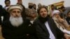 FILE - Pro-Taliban representatives attend a joint news conference after their talks with government representatives in Islamabad, Pakistan, Feb. 6, 2014. 