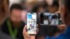 Фото: Apple iPhone 15 Pro на виставці в Каліфорнії, 12 вересня 2023 року. (Photo by Nic Coury / AFP)