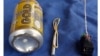 This undated image made available in the Islamic State's English-language magazine Dabiq, Wednesday, Nov. 18, 2015, claims to show the bomb that was used to blow up a Metrojet passenger plane bound for St. Petersburg, Russia, that crashed in Hassana, north Sinai, Egypt, killing all 224 people on board. 