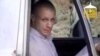 In this image taken from video obtained from Voice Of Jihad Website, which has been authenticated based on its contents and other AP reporting, Sgt. Bowe Bergdahl sits in a vehicle guarded by the Taliban in eastern Afghanistan.