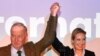 AfD top candidates Alexander Gauland, left, and Alice Weidel celebrate with their supporters during the election party of the nationalist 'Alternative for Germany', AfD, in Berlin, Sept. 24, 2017, after the polling stations closed.