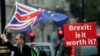 An anti-Brexit poster is seen in front of the Houses of Parliament in London, Sept. 4, 2018. 